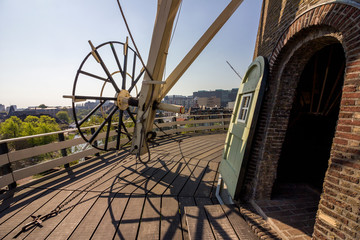 Leiden, Holland, Netherlands, April 21, 2019. CLose-up view of sail axle and vanes of cap loft and...