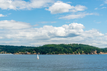 View over Inlet, ocean and island with mountains in beautiful British Columbia. Canada.