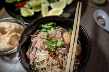 Thai style noodle blood soup,boat noodle,delicious dish,famous Thai noodle soup. Thai peoples call Boat Noodles. Close up or selective focus 