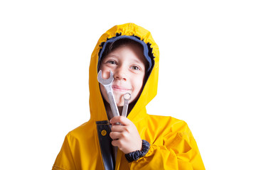 Kid girl with wrenches, repair tools holds thumb up.Building, repair, auto mechanic concept. 