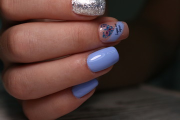 Closeup photo of a beautiful female hands with elegant manicure