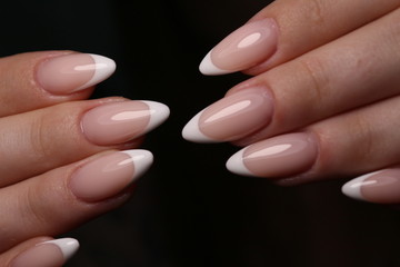 Closeup photo of a beautiful female hands with elegant manicure