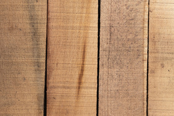 Background in the form of four vertical boards of light brown color