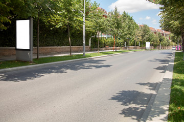advertising board on asphalt road