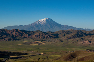 Breathtaking view of Mount Ararat, Agri Dagi, the highest mountain in the extreme east of Turkey accepted in Christianity as the resting place of Noah's Ark, a snow-capped and dormant compound volcano