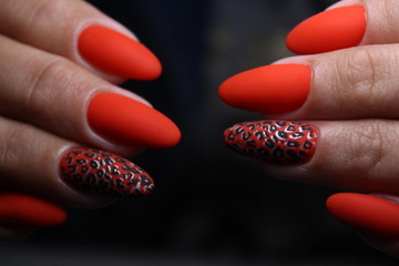 glamorous beautiful manicure on a trendy texture