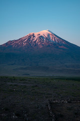 Breathtaking sunset on Mount Ararat, Agri Dagi, the highest mountain in the extreme east of Turkey accepted in Christianity as the resting place of Noah's Ark, snow-capped and dormant compound volcano