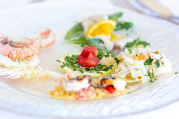 Elegant restaurant serving sea food and salad specialty