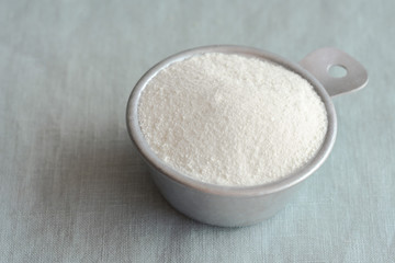 Nonfat Dry Milk in a Measuring Cup