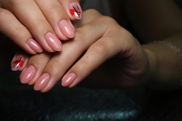 Trendy manicure design on a beautiful background.