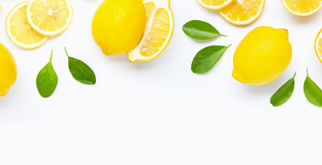 Fresh lemon and  slices with leaves isolated on white