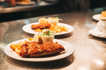 Food orders on the kitchen table in the restaurant