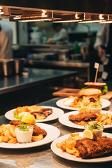 Food orders on the kitchen table in the restaurant