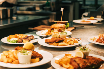 Food orders on the kitchen table in the restaurant