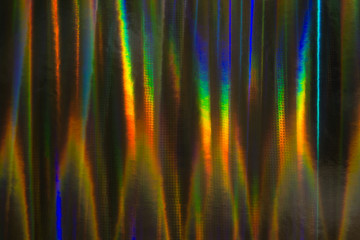 Abstract background of holographic strings of all rainbow colors.