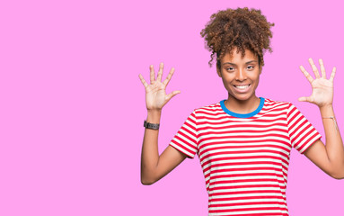 Beautiful young african american woman over isolated background showing and pointing up with fingers number ten while smiling confident and happy.