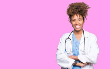 Young african american doctor woman over isolated background happy face smiling with crossed arms...