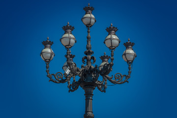 Fototapeta na wymiar The public lighting of St. Peter's Square in the Vatican