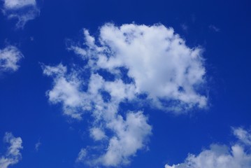 big white cloud on blue day sky