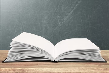 Open book isolated on white and letters