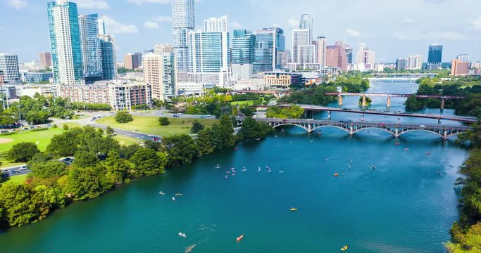 4K Cinematic Aerial Hyperlapse of Austin Skyline with Kayaks on the River
