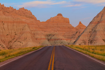 Highway into Badlands National Park with colorful Geographic Rock Formations -horizontal
