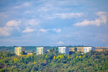 high-rise buildings in the green urban park