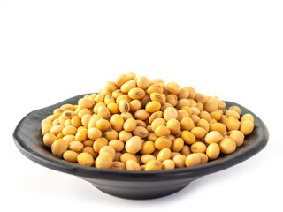 Soybean seeds  in a wooden bowl.
