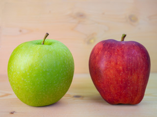 Ripe apples on the wood floor.