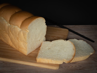 Loaf of bread on a wooden table