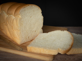 Loaf of bread on a wooden table