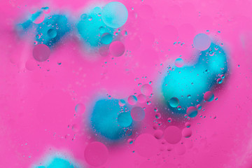 Abstract macro molecular pattern of colored oil bubbles on water. 