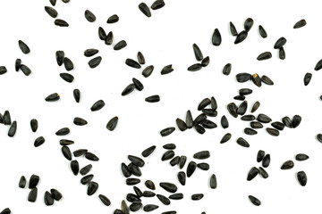 Fototapeta na wymiar Sunflower seeds, background or texture isolated on white. lose-up.