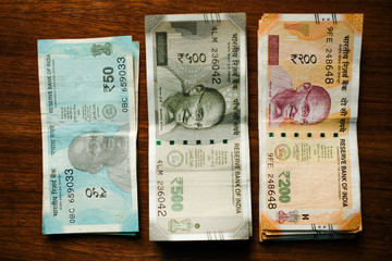 Indian currency in abundance. Flat lay on table