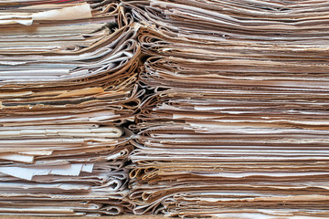 pile of paper documents in the office