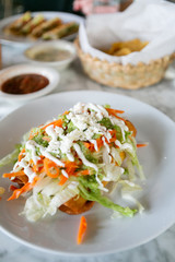 Flautas, 3 flour tortillas rolled with chipotle chicken, lettuce, tomatillo avocado salsa, pickled carrots, queso fresco, crema, taquitos 