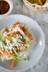 Flautas, 3 flour tortillas rolled with chipotle chicken, lettuce, tomatillo avocado salsa, pickled carrots, queso fresco, crema, taquitos 