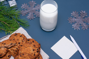 Note the position of Santa Claus on a plain background. Holiday concept, New Year and Christmas.