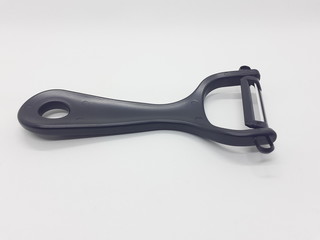 Black Plastic Fruit Peeler with Ceramic Knife Blade for Kitchen Utensils in White Isolated Background