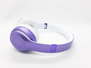 Beautiful Modern Elegant Purple Color Audio Headset with Wireless Electronic Technology in White Isolated Background