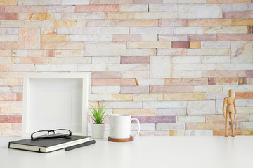 Mockup workspace desk and copy space books,plant and coffee on white desk.