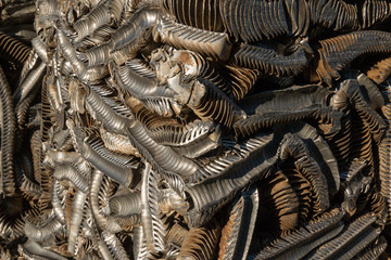 Pressed metal from appliances.