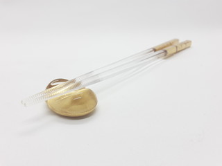 Japanese Elegant Luxury Modern Classic Golden Transparent Chopstick in White Isolated Background