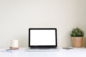 Fototapeta premium Workspace desk and laptop. copy space and blank screen. Business image, Blank screen laptop and supplies.