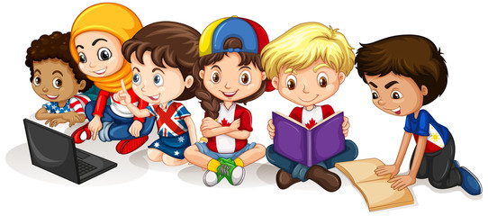 Happy children reading and working on computer