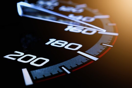 Speed meter of a car close up, Pointer indication on speed bar.