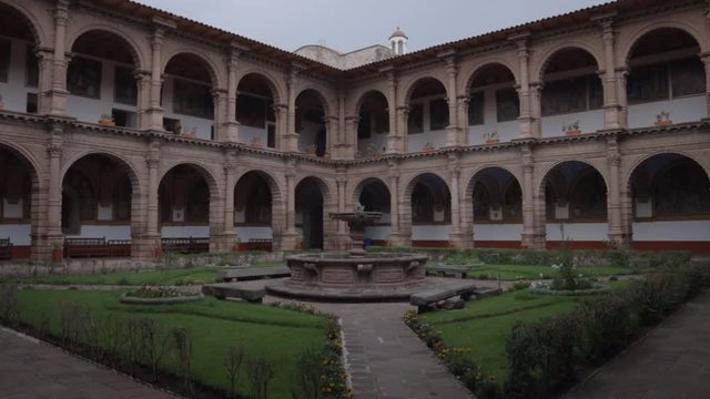 Museum courtyard in Cusco with a beautiful tranquil fountain. Experiences during travel in Peru.