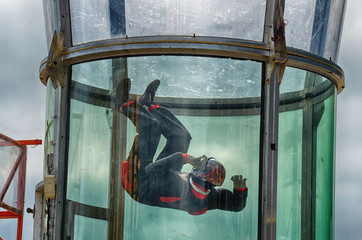 Aerial acrobatics in a wind tunnel.