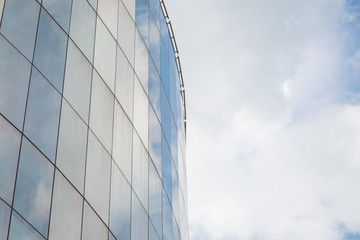 Fototapeta na wymiar Blue glass of windows building