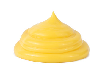 Drop of tasty yellow cheese sauce on a white background